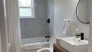 Hair dryer, towels, soap, shampoo