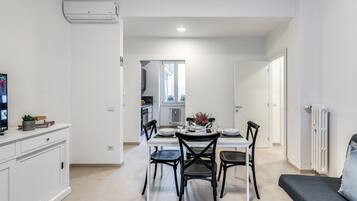 Condo | Living area | 32-inch flat-screen TV with satellite channels