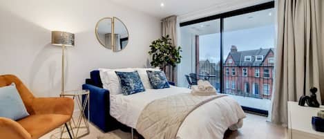 Deluxe appartement | Woonruimte | Flatscreentelevisie