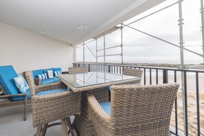 Outdoor dining - Oceanfront Condo in Wild Dunes! Community Pool! Great View Looking at Ocean! (Isle Of Palms)