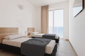 Apartment, 2 Bedrooms, Beachfront | Premium bedding, in-room safe, blackout drapes, soundproofing - Hotel Delfino (Marciana)