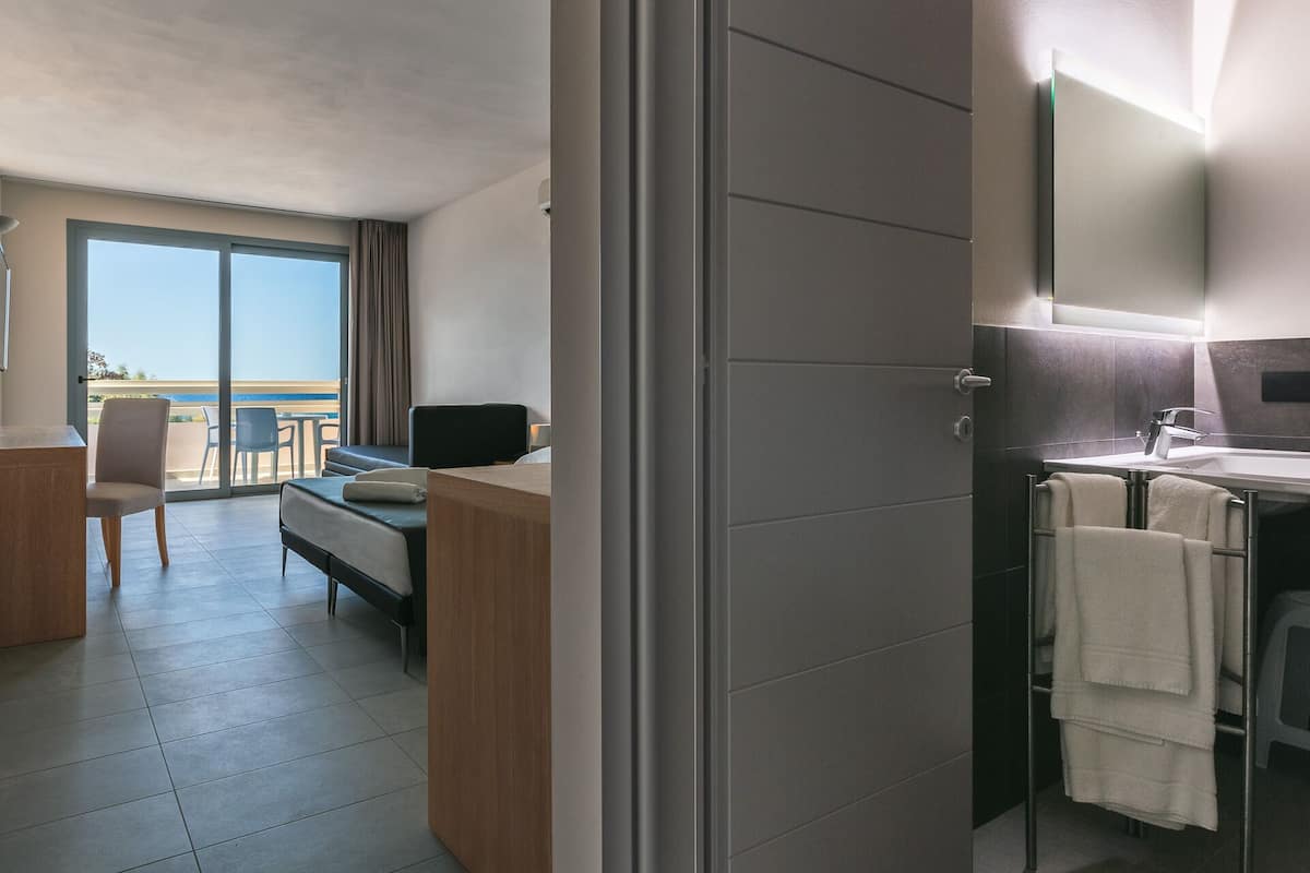 Superior Triple Room, Sea View, Beachfront | 1 bedroom, premium bedding, in-room safe, blackout drapes