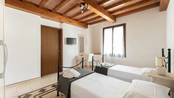 Apartment, 3 Bedrooms, Beach View, Beachfront | Premium bedding, in-room safe, blackout curtains, soundproofing