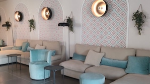 A modern lounge area with sofas, armchairs, and a coffee table. - Best Western Hotel Massafra (Massafra)