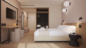 A modern hotel room with a large bed, a desk, a mirror, and a wardrobe. - Best Western Hotel Massafra (Massafra)