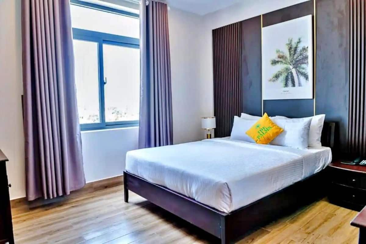 Deluxe Room with City View | 1 bedroom, down comforters, memory foam beds, minibar