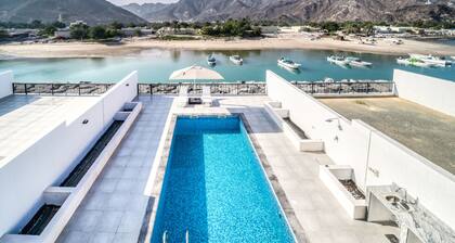 High-end 4BR Villa with Assistantâs Room Al Dana Island, Fujairah by Deluxe Holiday Homes