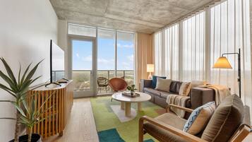 Luxury Condo | Living area | LED TV, streaming services