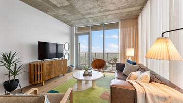 Luxury Condo | Living area | LED TV, streaming services