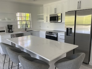 Fridge, microwave, oven, stovetop - 7mile-Island Hideaway-2bed/2bath-King & Queen Beds-Pool-walk to beach & shops! (George Town)