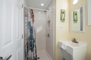 Shower, towels, soap, shampoo