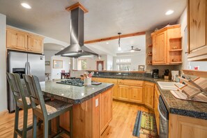 Fridge, microwave, oven, stovetop - Spacious 2-story home with deck, fireplace, & W/D - near Glacier National Park (Whitefish)