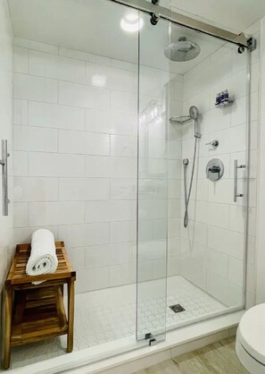 Shower, eco-friendly toiletries, hair dryer, towels
