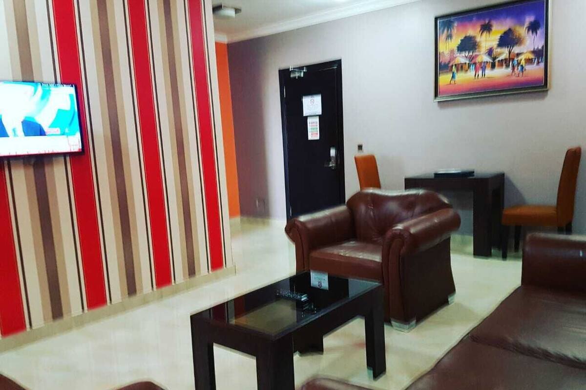 Standard Suite, Multiple Beds, Refrigerator | Living area | 32-inch Smart TV with satellite channels