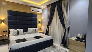 Suite Studio Deluxe, 1 trÚs grand lit, réfrigérateur | 1 chambre, draps italiens Frette, literie de qualité supérieure
