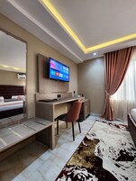 Deluxe Single Room, 1 Queen Bed, Refrigerator | Frette Italian sheets, premium bedding, in-room safe, desk