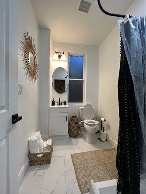 Hair dryer, towels, soap, toilet paper
