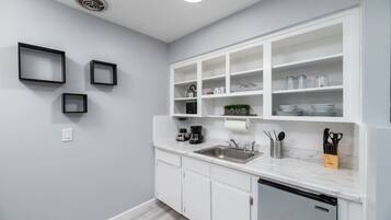 Microwave, stovetop, coffee/tea maker, toaster