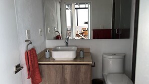 Shower, eco-friendly toiletries, towels, soap