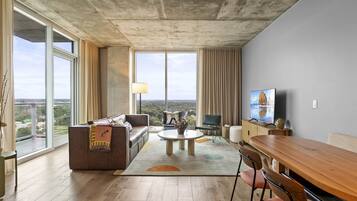 Luxury Condo, 1 King Bed with Sofa bed, Balcony, City View | Living area | LED TV, Netflix, streaming services