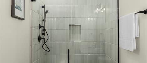 Shower, hair dryer, towels, soap