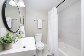 Hair dryer, towels, soap, toilet paper