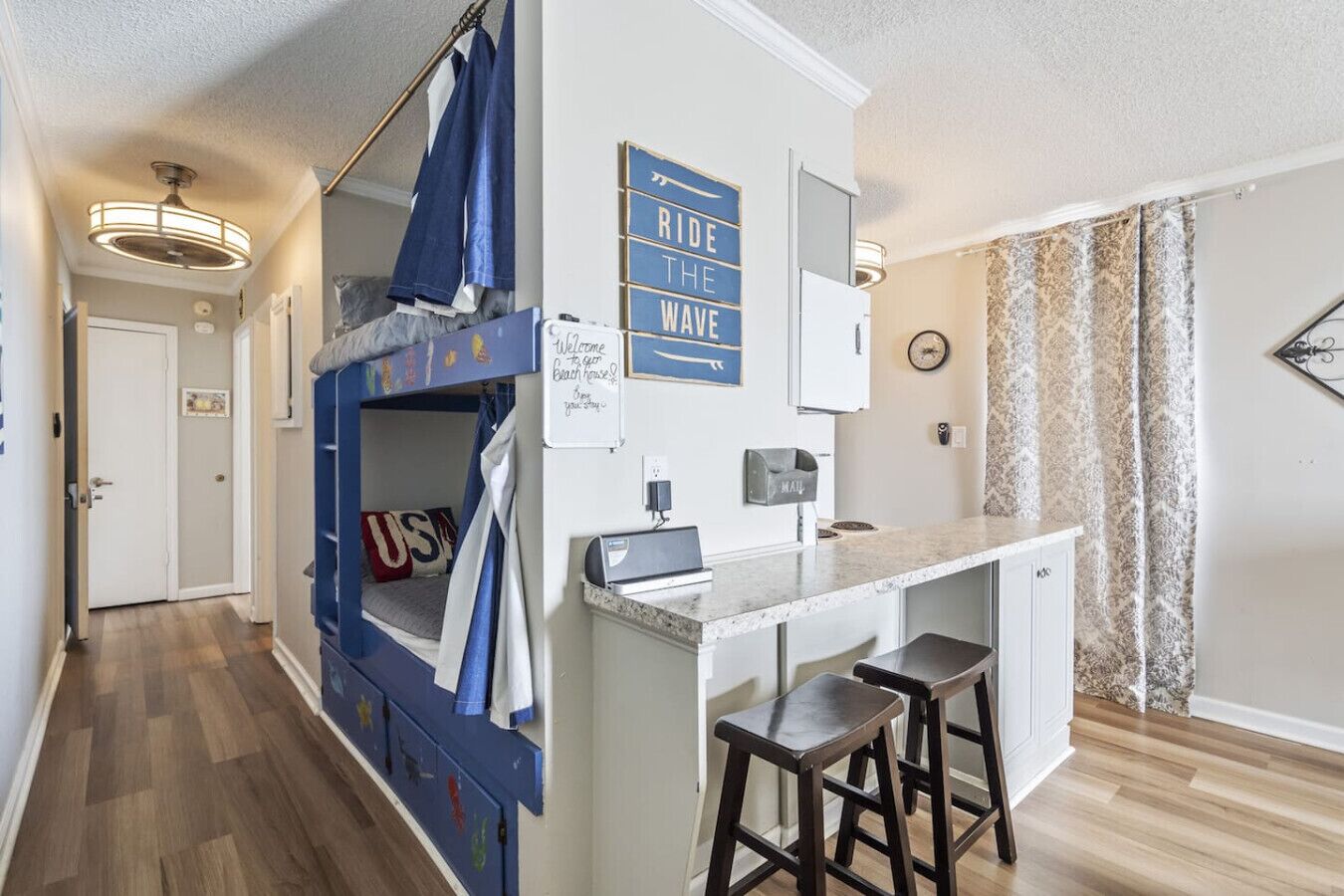 1 bedroom, desk, iron/ironing board, travel crib