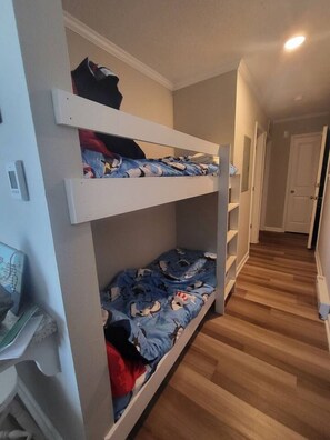 1 bedroom, desk, iron/ironing board, travel crib