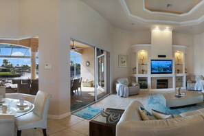 Smart-tv, eldstad, tv-spel och en stereo