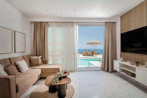 Signature Villa, 2 Bedrooms, Private Pool, Sea View | Living area | 55-inch Smart TV with digital channels, Netflix, streaming services - Ocean Luxury Villas (Zakynthos)