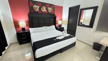 Habitación Deluxe, 1 cama King size, hidromasaje | Caja de seguridad en la habitación, escritorio y wifi gratis