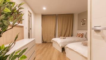 3 slaapkamers, een strijkplank/strijkijzer, wifi, beddengoed