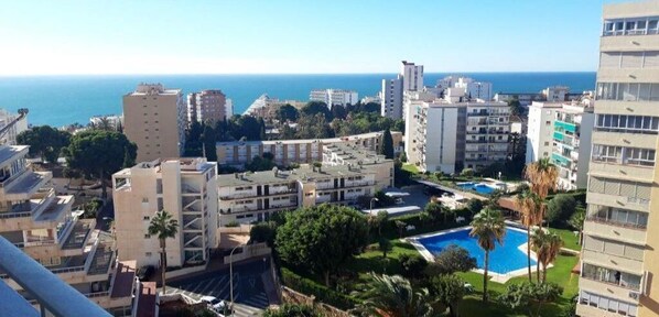 Enjoy a refreshing swim in our rooftop pool surrounded by lush greenery and stunning sea views.