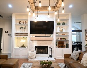 Smart TV, fireplace, video library