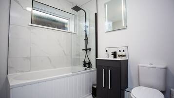 Shower, hair dryer, shampoo
