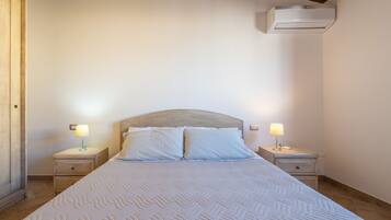 3 slaapkamers, een strijkplank/strijkijzer, beddengoed