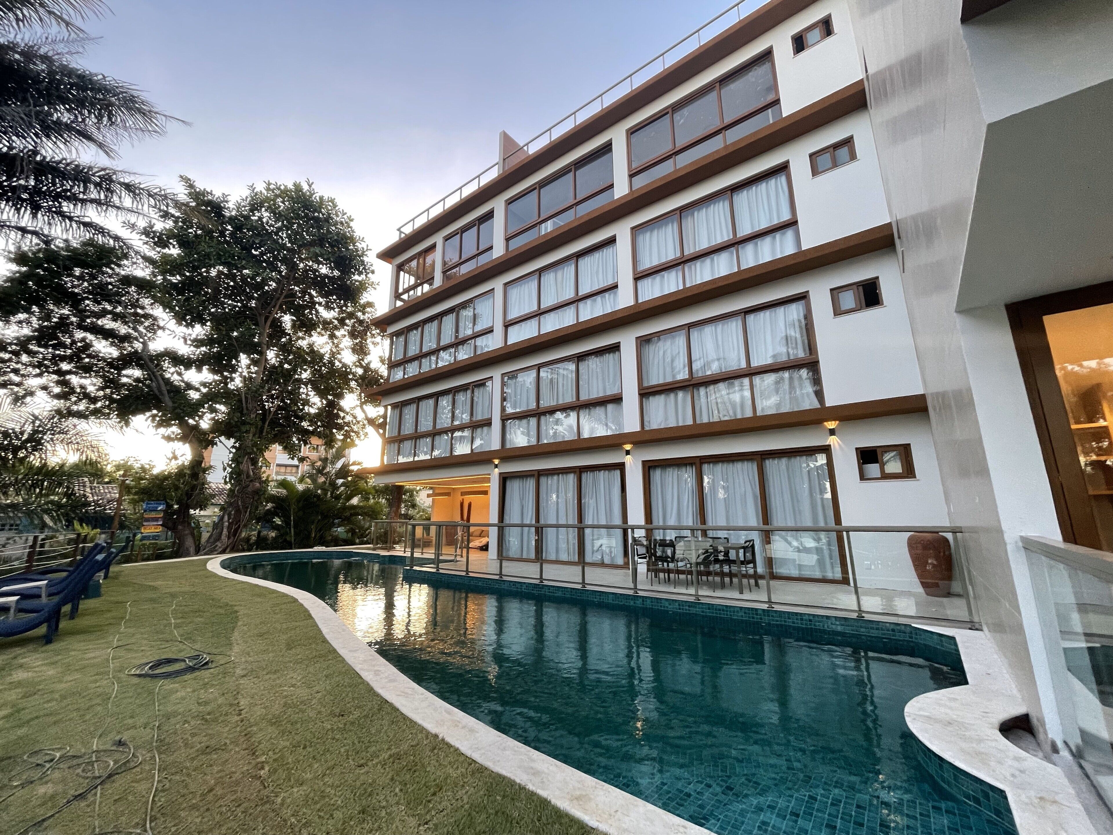 Outdoor pool, open 9:00 AM to 8:00 PM, pool umbrellas, pool loungers