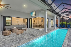 A heated pool - Begonia Bay | Modern 5BR+Den w/ Pool, Hot Tub, Gulf Access & Dock (Marco Island)