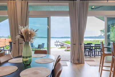 Relaxing Lakefront Escape with Hot Tub, Fire Pit, Kayaks & Paddle Boards