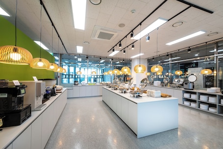 Restaurant. The Triny Urban Suites
