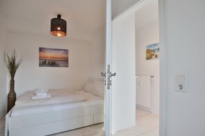 1 slaapkamer, een strijkplank/strijkijzer, wifi