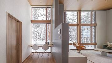 Luxury Chalet | Living area | 55-inch flat-screen TV with digital channels, fireplace, Netflix