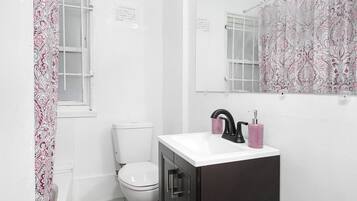 Hair dryer, towels, soap, shampoo