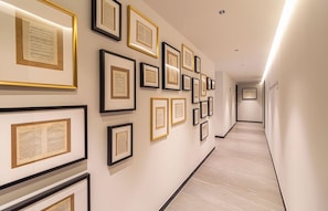 Discover a gallery of historical achievements and recognition in this elegant hallway.