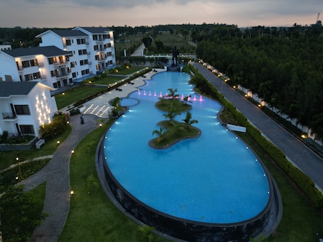 Outdoor pool. Sportico Resort Bangalore