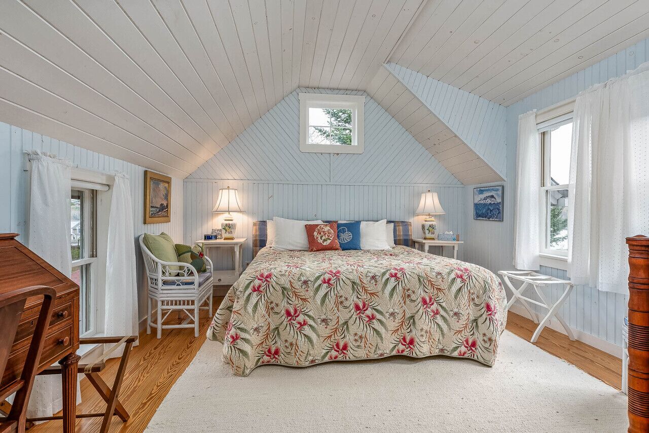 Second floor bedroom with king-sized bed and clothing storage