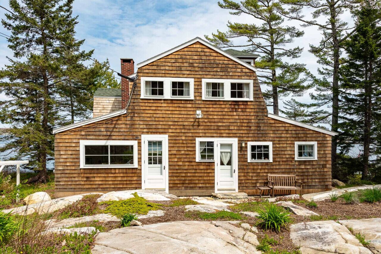 An enchanting Maine cottage, where timeless charm meets modern luxury!