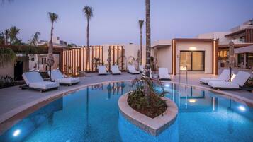 Seasonal outdoor pool, pool umbrellas, pool loungers
