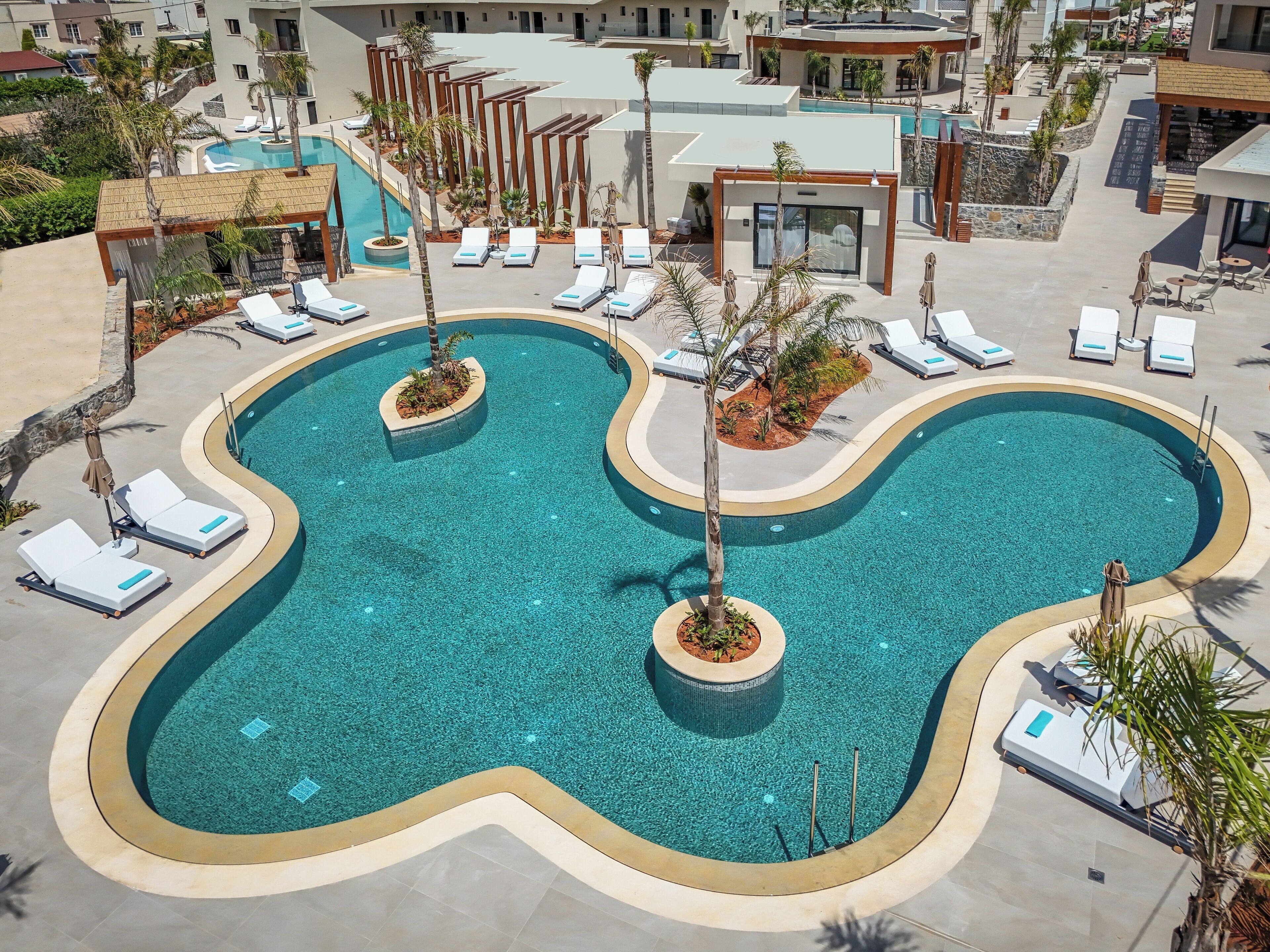 Seasonal outdoor pool, pool umbrellas, pool loungers