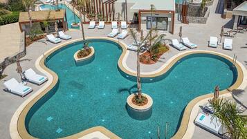 Seasonal outdoor pool, pool umbrellas, pool loungers